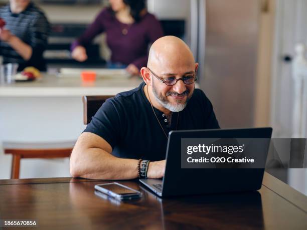 6,778 Bald Man Using Computer Stock Photos, High-Res Pictures, and ...