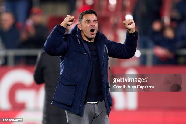 Head Coach Miguel Angel Sanchez 'Michel' of Girona FC celebrates the victory following the LaLiga EA Sports match between Girona FC and Deportivo...