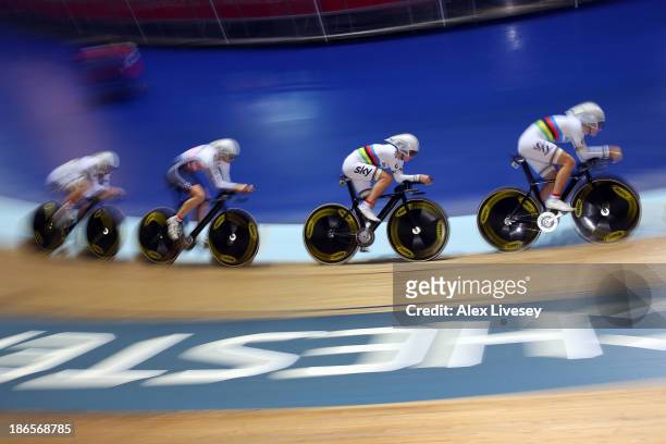 Dani King, Elinor Barker, Joanna Rowsell and Laura Trott of Great Britain in action on their way to winning gold and setting a new world record time...
