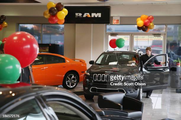 Chrysler Group vehicles are offered for sale at the Marino Chrysler Jeep Dodge dealership on November 1, 2013 in Chicago, Illinois. The Chrysler...
