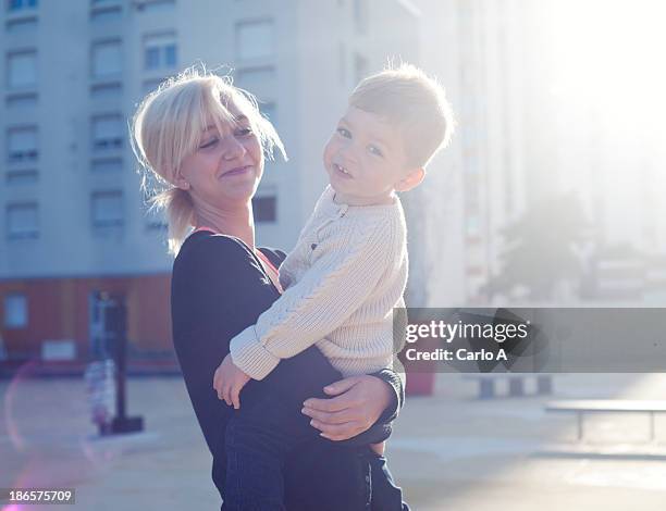 smiling - single mother portrait stock pictures, royalty-free photos & images