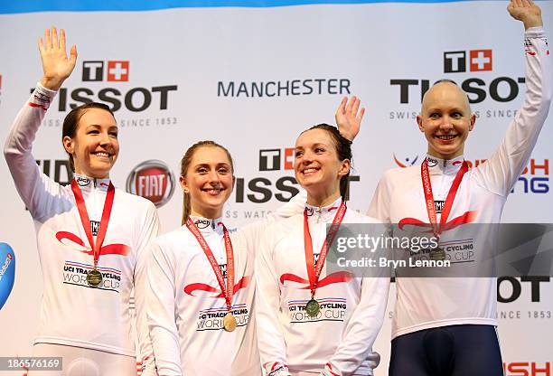 Gold medal winners Dani King, Laura Trott, Elinor Barker and Joanna Rowsell of Great Britain celebrate on the podium after the Women's Team Pursuit...