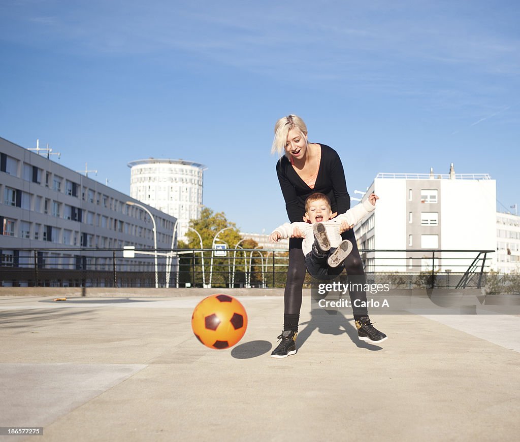 Family playing football