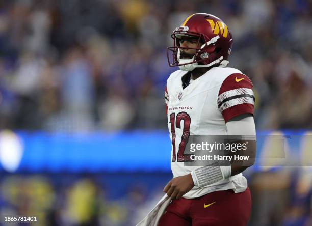 Jacoby Brissett of the Washington Commanders reacts after a Commander penalty during a 28-20 loss to the Los Angeles Rams at SoFi Stadium on December...