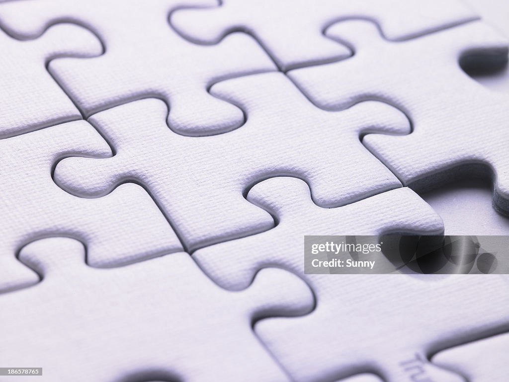 White puzzle pieces closeup