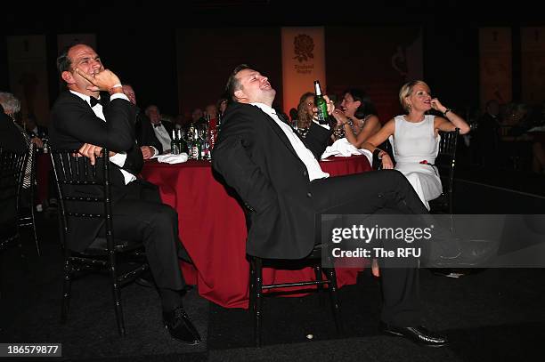 In this handout image provided by the RFU, Martin Johnson, the World Cup winning captain laughs with team mate Mark Regan during the England RWC 2003...