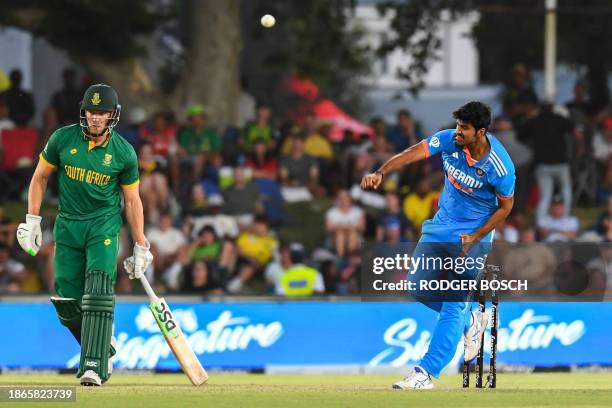 India's Washington Sundar delivers a ball during the third one-day international cricket match between South Africa and India at Boland Park in Paarl...