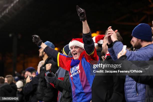 Crystal Palace fan in a Santa hat during the Premier League match between Crystal Palace and Brighton & Hove Albion at Selhurst Park on December 21,...