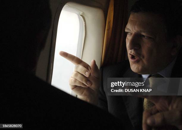 European Commission President, Portugal's Jose Manuel Barroso talks with Slovakia's Prime Minister Mikulas Dzurinda during a trip over western...