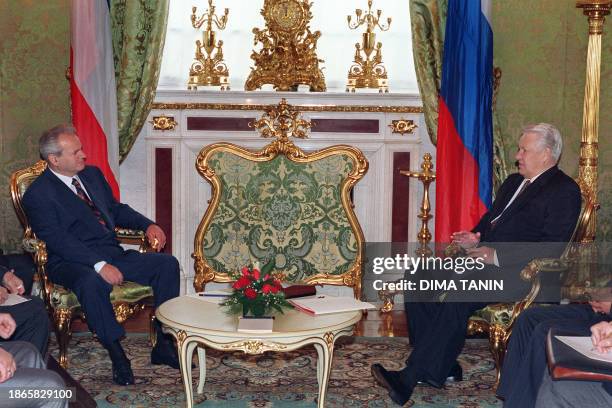 Russian President Boris Yeltsin confers with Yugoslavian President Slobodan Milosevic 10 August 1995 in Kremlin. Milosevic, 63 in 2005, faces more...