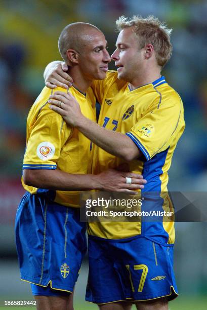 June 15: Henrik Larsson of Sweden and Anders Andersson celebrate during the UEFA Euro 2004 match between Sweden and Bulgaria at Jose Alvalade Stadium...