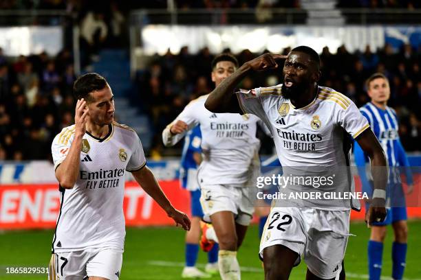 Real Madrid's Spanish forward Lucas Vazquez celebrates with Real Madrid's German defender Antonio Rudiger after scoring his team's first goal during...