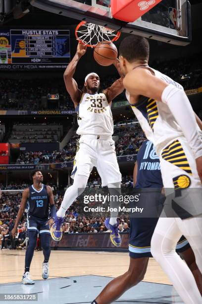 Myles Turner of the Indiana Pacers dunks the ball during the game against the Memphis Grizzlies on December 21, 2023 at FedExForum in Memphis,...