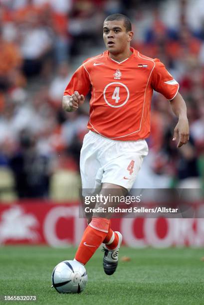 June 15: Wilfred Bouma of Netherlands on the ball during the UEFA Euro 2004 match between Germany and Netherlands at Dragao Stadium on June 15, 2004...