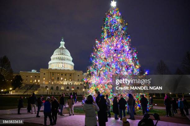 The Capitol Christmas tree is seen on the West Front of the US Capitol in Washington, DC on December 21, 2023. The tree is a 63-foot Norway spruce...