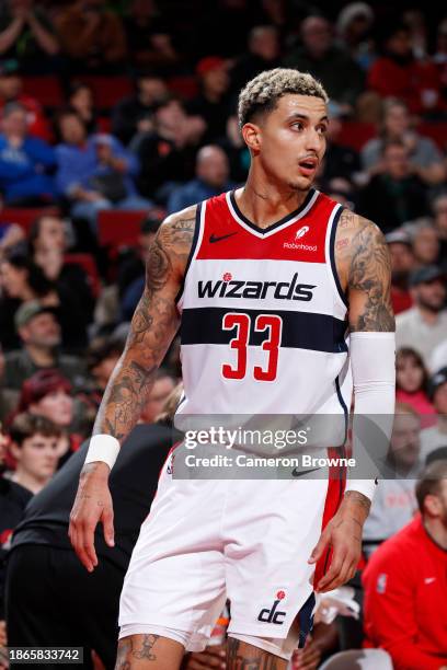 Kyle Kuzma of the Washington Wizards looks on during the game against the Portland Trail Blazers on December 21, 2023 at the Moda Center Arena in...