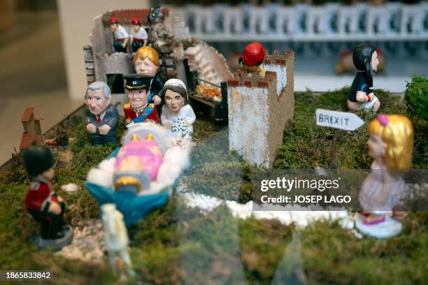 Picture shows a scene depicting the funerals for Britain's Queen Elisabeth II, created using the Catalan typical clay figurines, called "caganers" ,...