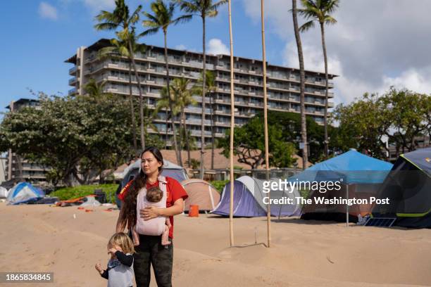 Lahaina, HI Jordan Ruidas, back, one of the organizers with Lahaina Strong, an organization focusing on helping families affected by Lahaina...