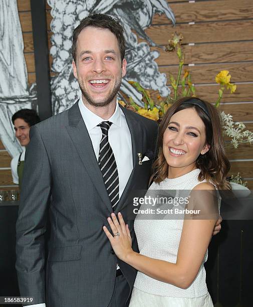 Hamish Blake and Zoe Foster attend the Myer marquee on Victoria Derby Day at Flemington Racecourse on November 2, 2013 in Melbourne, Australia.