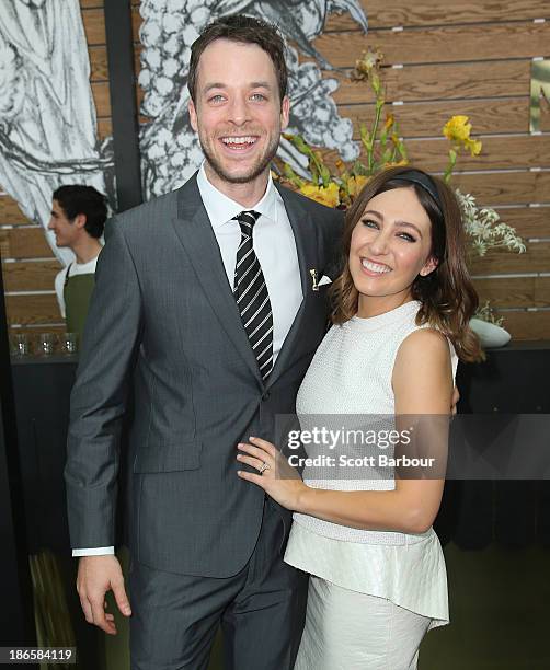 Hamish Blake and Zoe Foster attend the Myer marquee on Victoria Derby Day at Flemington Racecourse on November 2, 2013 in Melbourne, Australia.