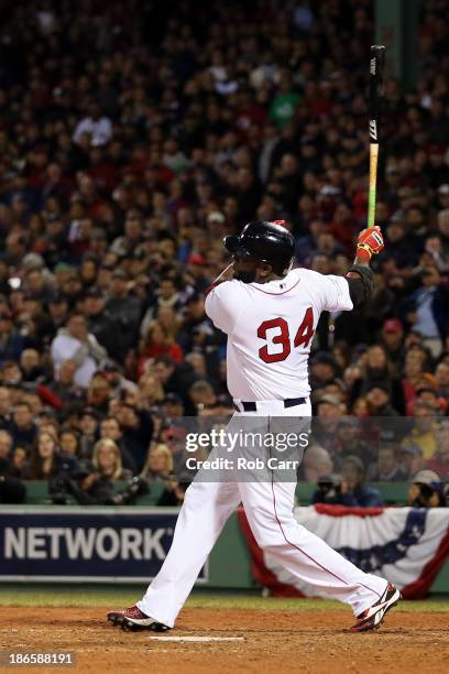 David Ortiz of the Boston Red Sox in actions against the St. Louis Cardinals during Game Six of the 2013 World Series at Fenway Park on October 30,...