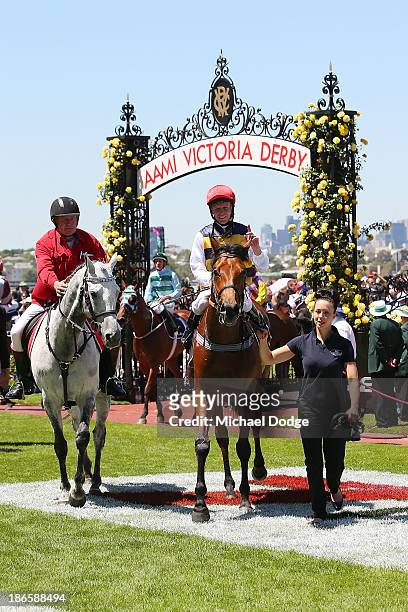 Kerrin McEvoy on Ruscello returns to scale after winning race 3 the Lexus Stakes during Derby Day at Flemington Racecourse on November 2, 2013 in...