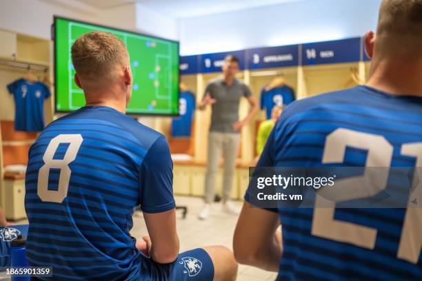 soccer players listening to coach game strategy - pre positioned stock pictures, royalty-free photos & images