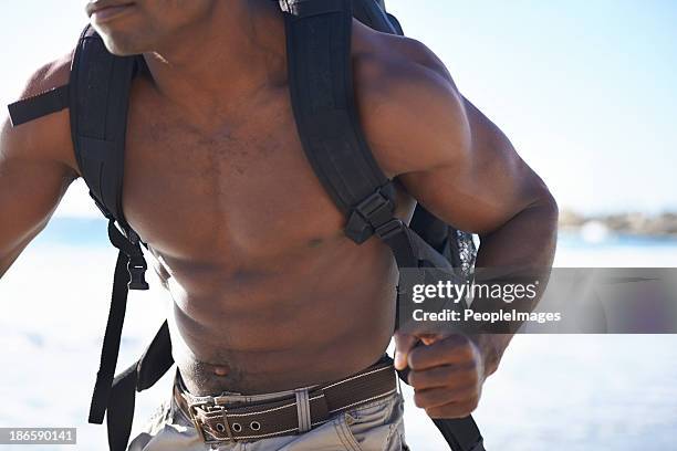 muscles and stamina - muscle men at beach stock pictures, royalty-free photos & images