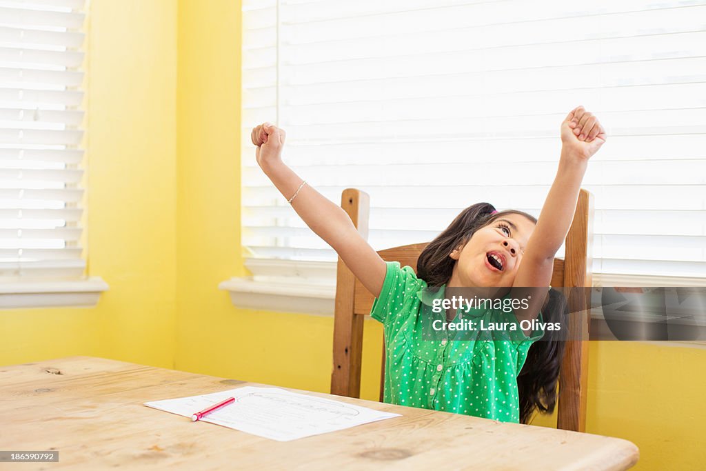 Girl Celebrates Her Homework