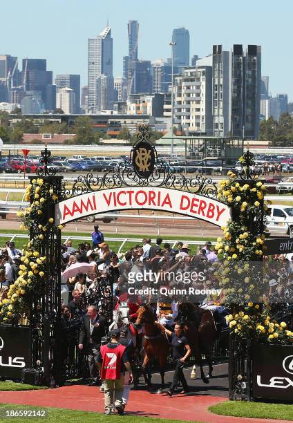 Kerrin McEvoy riding Ruscello returns to scale after winning race 3 Lexus Stakes during Derby Day at Flemington Racecourse on November 2, 2013 in...