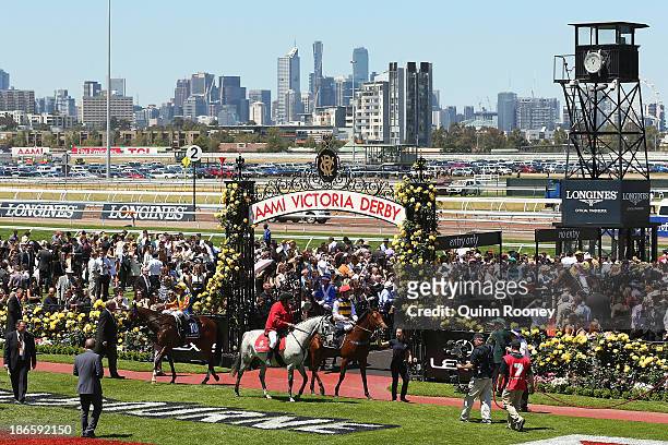 Kerrin McEvoy riding Ruscello returns to scale after winning race 3 Lexus Stakes during Derby Day at Flemington Racecourse on November 2, 2013 in...
