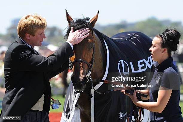 Trainer Ed Walker with Ruscello after winning race 3 the Lexus Stakes during Derby Day at Flemington Racecourse on November 2, 2013 in Melbourne,...