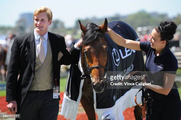 Trainer Ed Walker with Ruscello after winning race 3 the Lexus Stakes during Derby Day at Flemington Racecourse on November 2, 2013 in Melbourne,...
