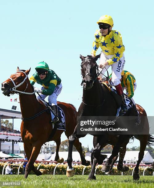 Jamie Spencer riding Side Glance wins race five the MacKinnon Stakes during Derby Day at Flemington Racecourse on November 2, 2013 in Melbourne,...