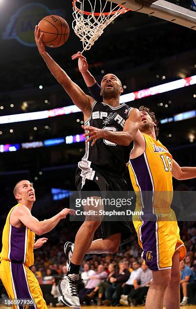 Tony Parker of the San Antonio Spurs shoots over pau Gasol of the Los Angeles Lakers at Staples Center on November 1, 2013 in Los Angeles,...