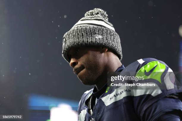 Geno Smith of the Seattle Seahawks looks on before a game against the Philadelphia Eagles at Lumen Field on December 18, 2023 in Seattle, Washington.