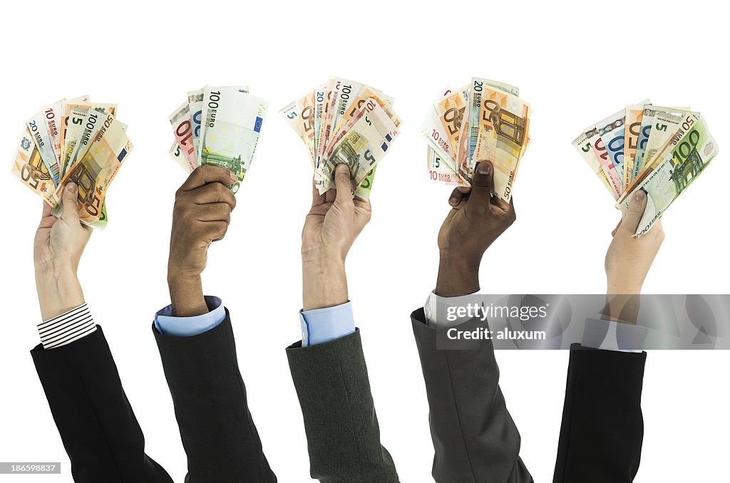 Assortfed hands with euro currency