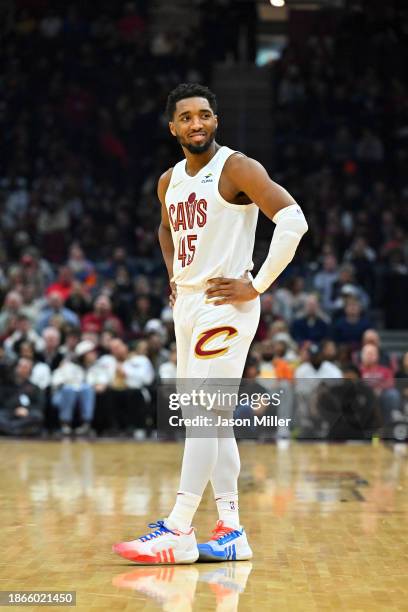 Donovan Mitchell of the Cleveland Cavaliers smiles during a pause against the Houston Rockets during the second quarter at Rocket Mortgage Fieldhouse...