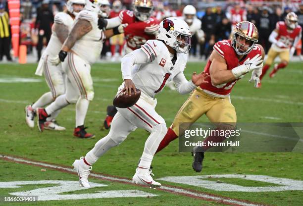 Kyler Murray of the Arizona Cardinals runs with the ball against the San Francisco 49ers at State Farm Stadium on December 17, 2023 in Glendale,...