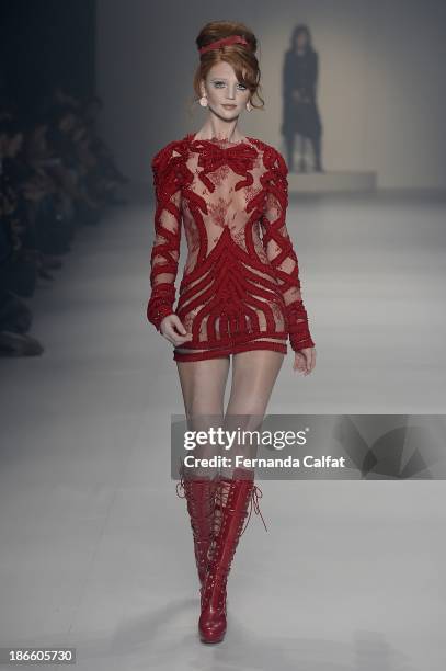 Cintia Dicker walks the runway at the Samuel Cirnansck show at Sao Paulo Fashion Week Winter 2014 on November 1, 2013 in Sao Paulo, Brazil.