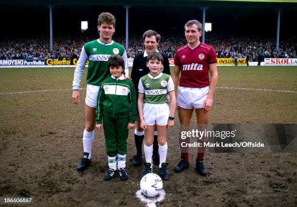Scottish Premier League Football, Hibernian v Hearts of Midlothian-, Captains Gordon Chisholm of Hibs and Albert Kidd stand with the mascots.