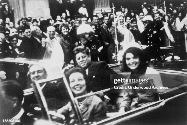 The Presidential motorcade with a close-up view of President and Mr Kennedy and Texas Governor John Connally and his wife, Dallas, Texas, November...