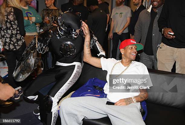 The Brooklyn Knight chats with Allen Iverson at the Miami Heat vs Brooklyn Nets game at Barclays Center on November 1, 2013 in the Brooklyn borough...