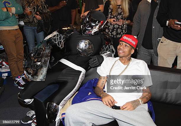 The Brooklyn Knight chats with Allen Iverson at the Miami Heat vs Brooklyn Nets game at Barclays Center on November 1, 2013 in the Brooklyn borough...
