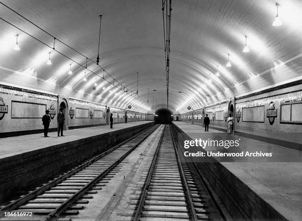 The 'Museum' subway station in Sydney with the platforms and the overhead electric lines used to power the subway trains, Sydney, Australia, 1932.