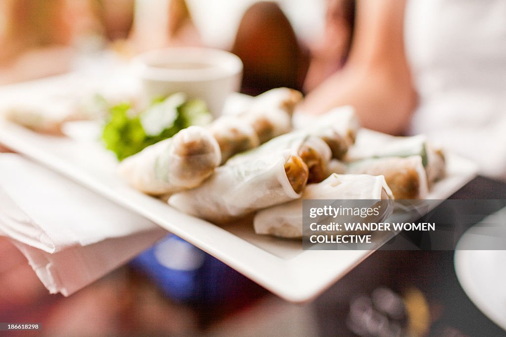Vietnamese rice paper rolls on plater