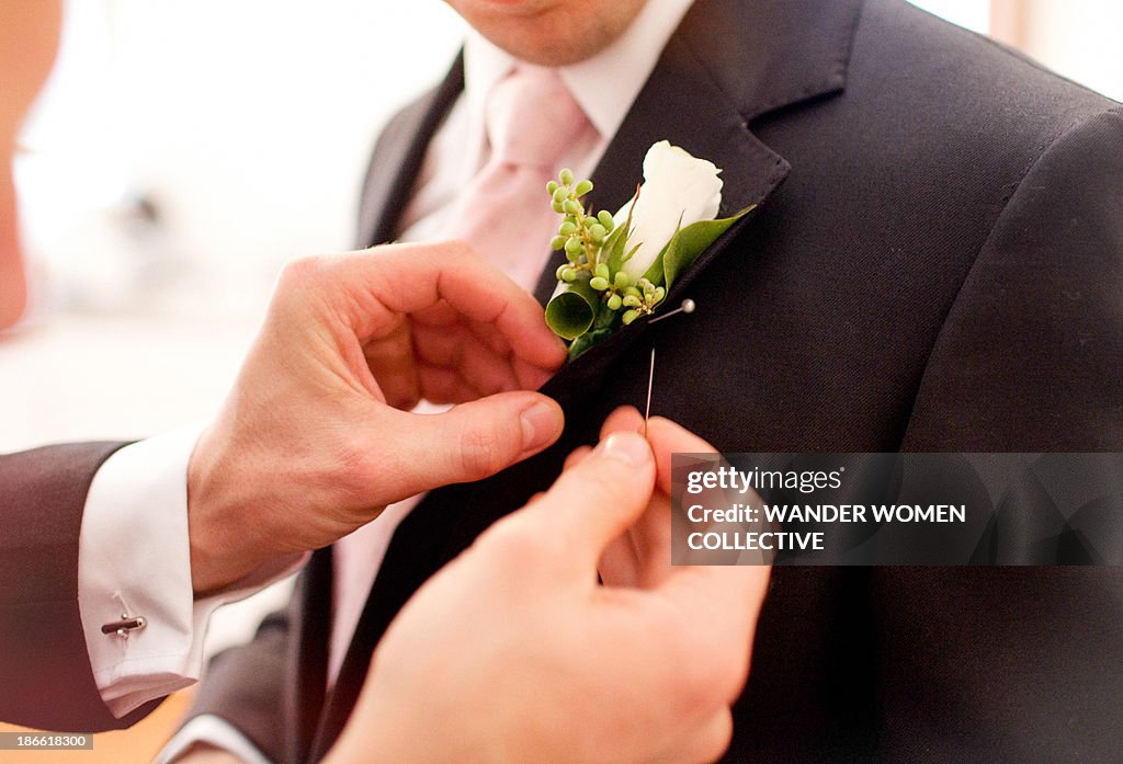 Groomsman pinning corsage