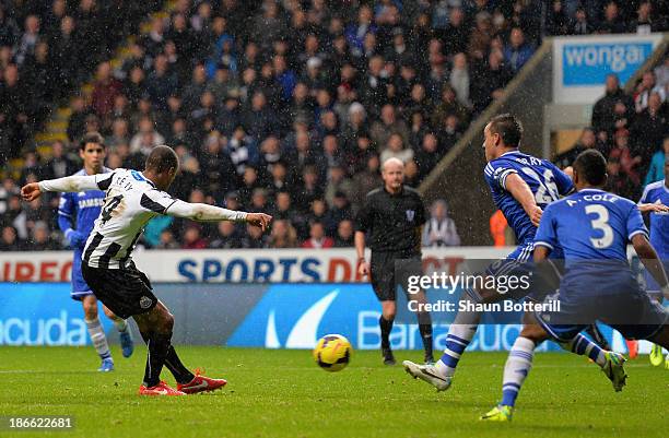 Loic Remy of Newcastle United scores their second goal during the Barclays Premier League match between Newcastle United and Chelsea at St James'...