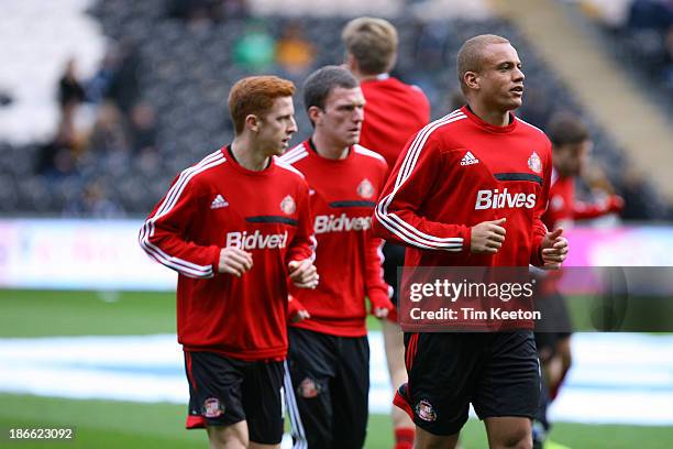 Sunderland's Wes Brown warming up during the Barclays Premier League match between Hull City and Sunderland at KC Stadium on November 02, 2013 in...