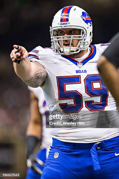 Doug Legursky of the Buffalo Bills points to the defense during a game against the New Orleans Saints at Mercedes-Benz Superdome on October 27, 2013...